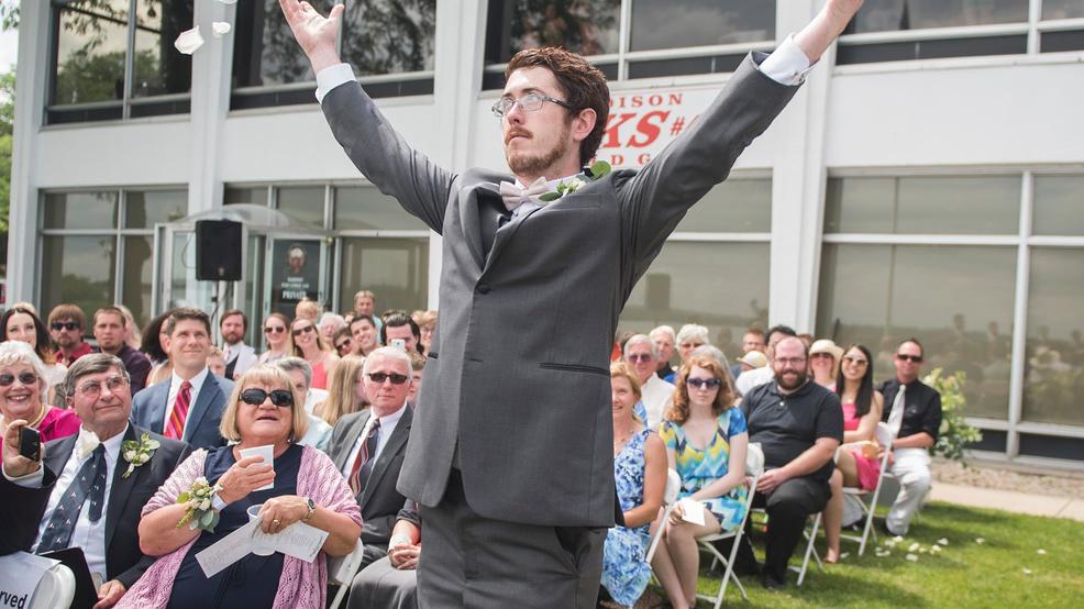 Flower Man walks aisle in Wisconsin wedding WLUK